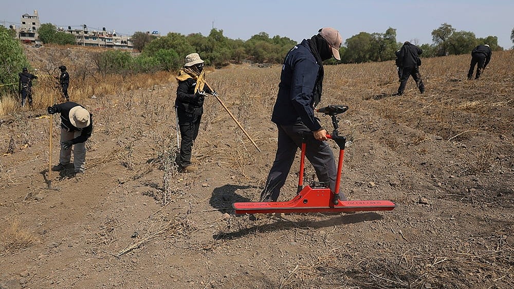 | Photo: AP/Ginnette Riquelme : Mexico Clandestine Graves